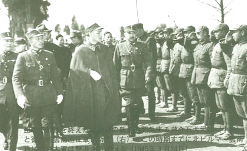 Chiang Kai-shek inspecting Chinese soldiers, 1945.
