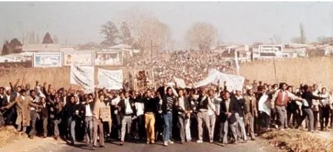Soweto youth marching towards Orlando Stadium, 1976. (Image by South African History Online)