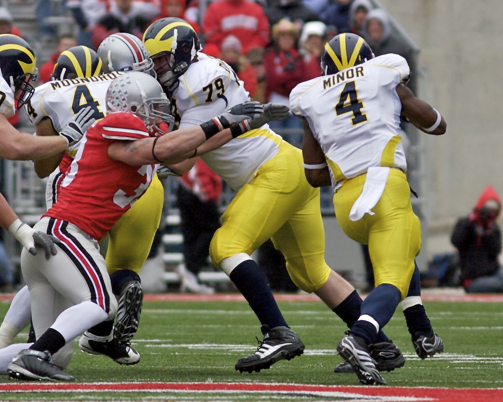 A game between The University of Michigan and The Ohio State University, members of the Big Ten Conference, one of the Power Five conferences.