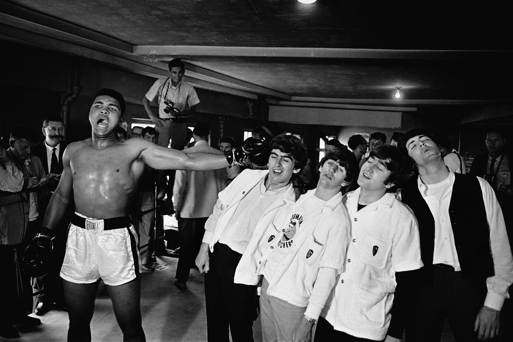 The Beatles, posed comically with ascendant heavyweight boxing contender Cassius Clay during their brief first tour of the United States in February 1964. Days later, Clay defeated Sonny Liston to claim the world’s heavyweight championship. Clay subsequently publicized that he had joined the Nation of Islam and changed his name to Muhammad Ali.