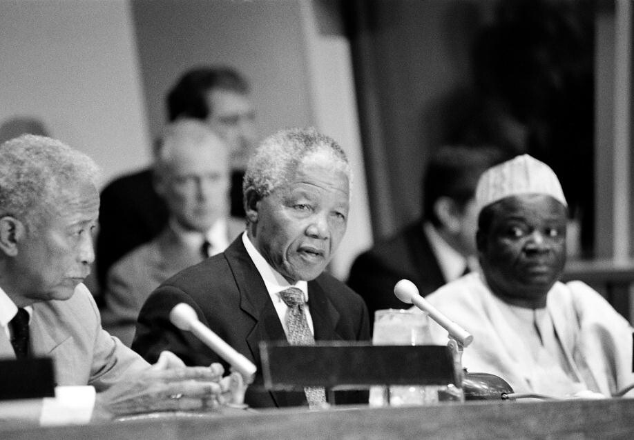 Nelson Mandela (center), President of the African National Congress of South Africa (ANC) at the UN Headquarters, 1993. UN Photo/John Isaac