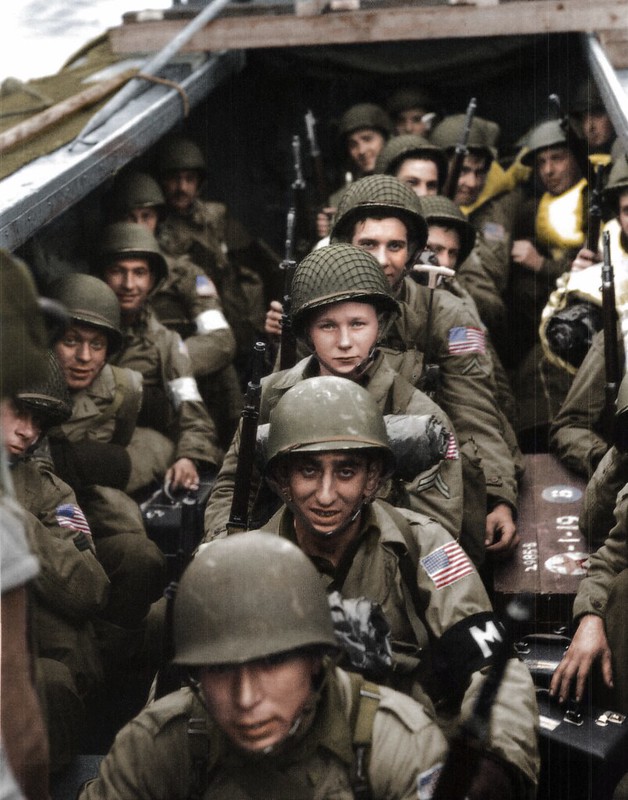 American servicemen pose for the camera aboard an Oran-bound LST during Operation Torch. Image courtesy of Cassowary Colorizations.