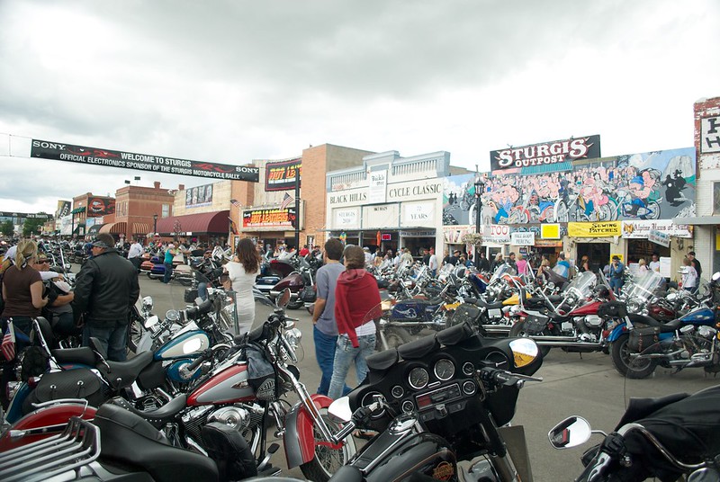 This image of the 2010 motorcycle rally shows the corporate sponsor Sony displayed on a banner over Main Street. (Image by Nicholas Ng)