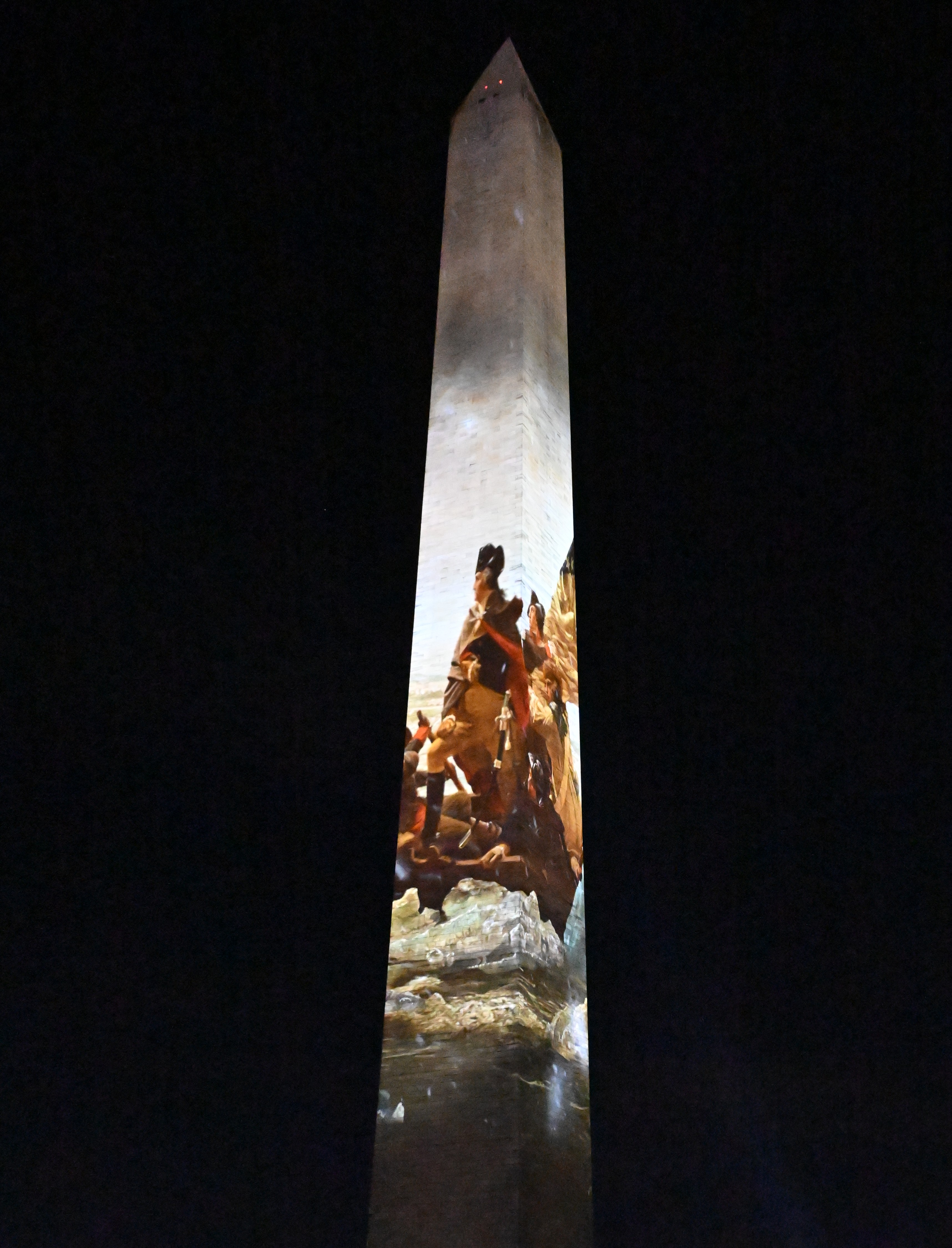  More details Washington Crossing the Delaware projected on the Washington Monument January 1, 2026