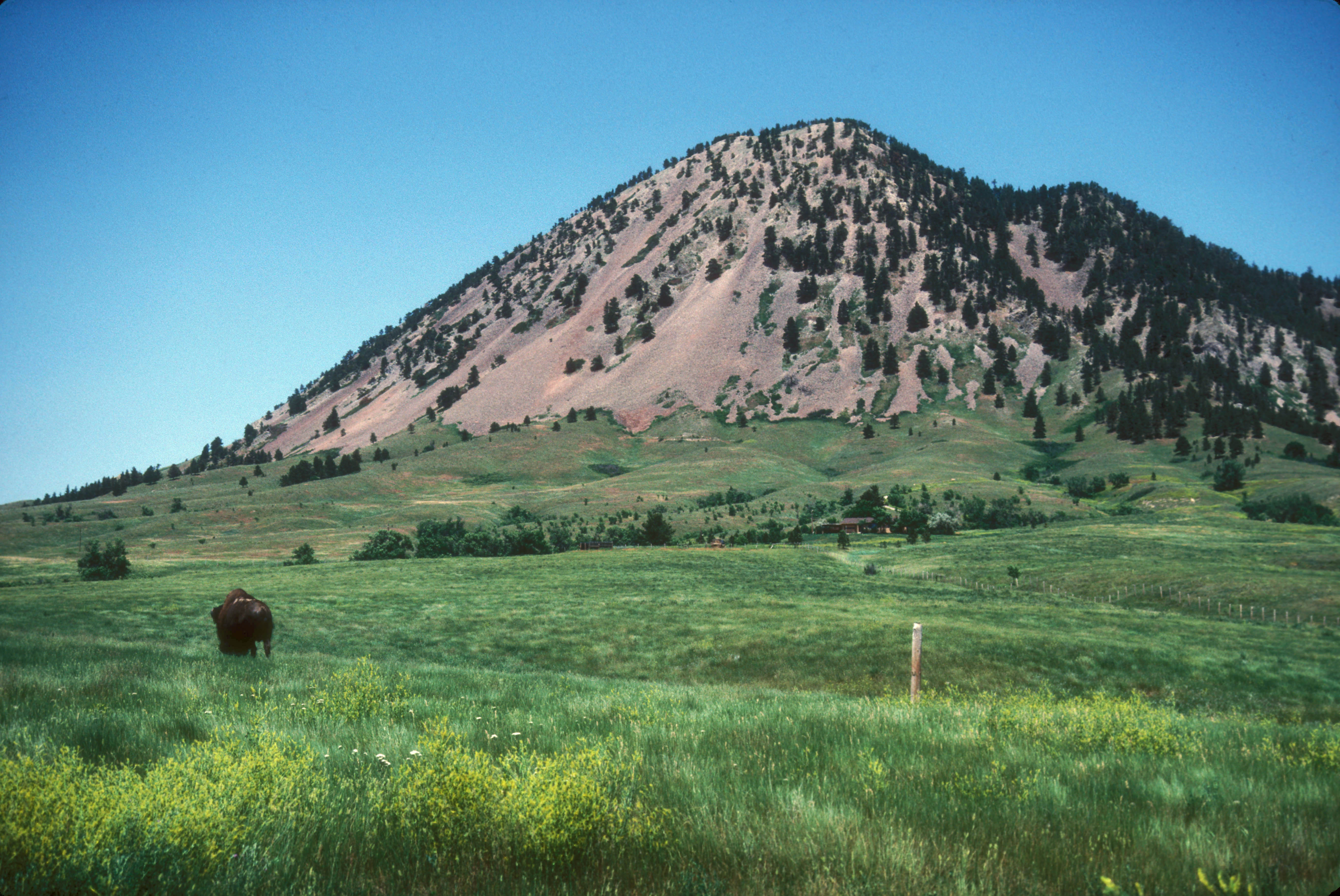 Bear Butte, located near Sturgis, South Dakota, is an indigenous religious site protected as a National Historic Landmark.