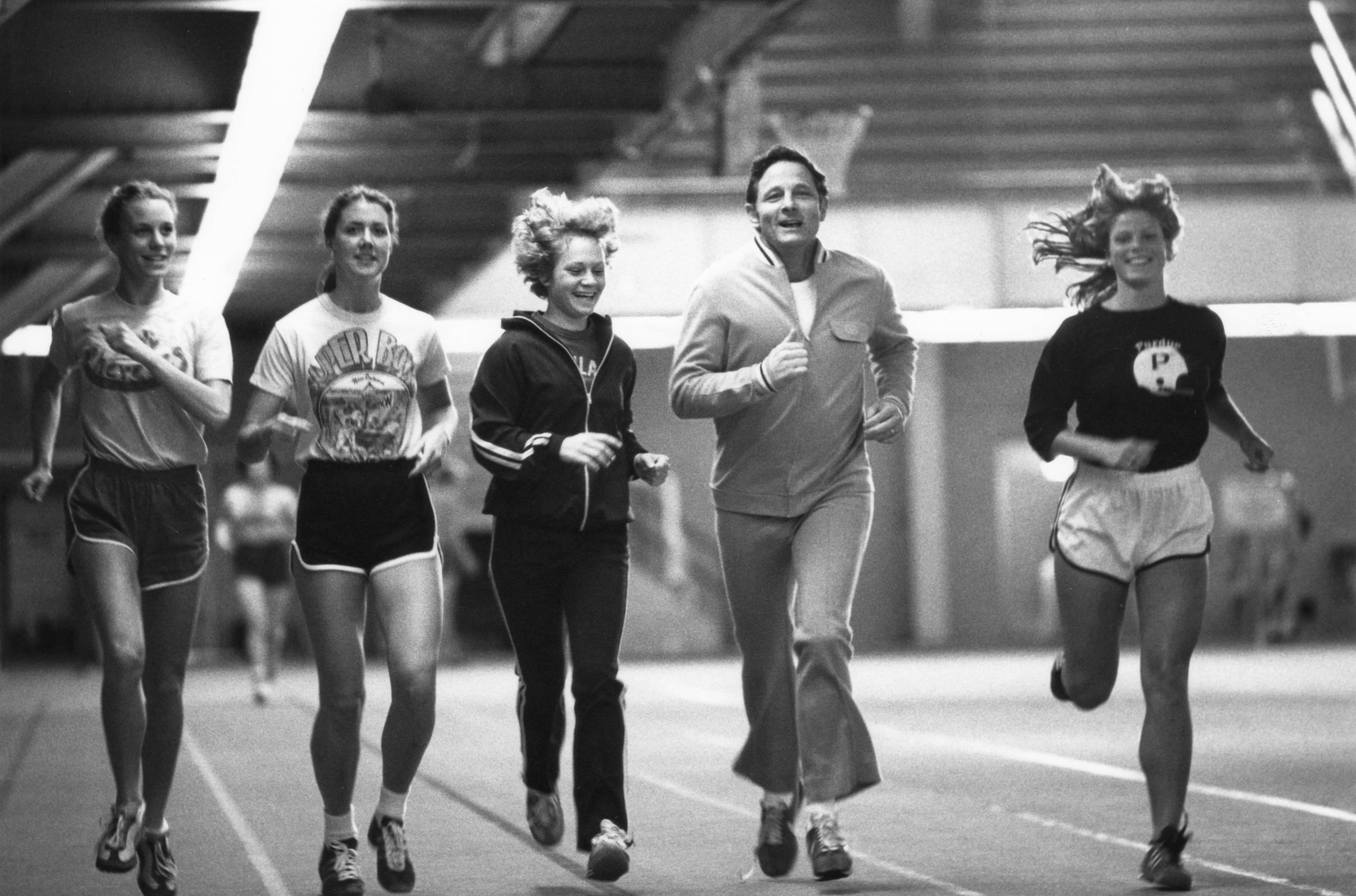 Senator Birch Bayh from Indiana exercises with Title IX athletes at Purdue University in the 1970s.
