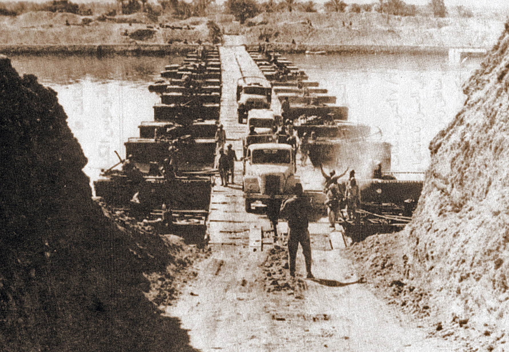 Egyptian forces crossing the Suez Canal during the first week of the war.