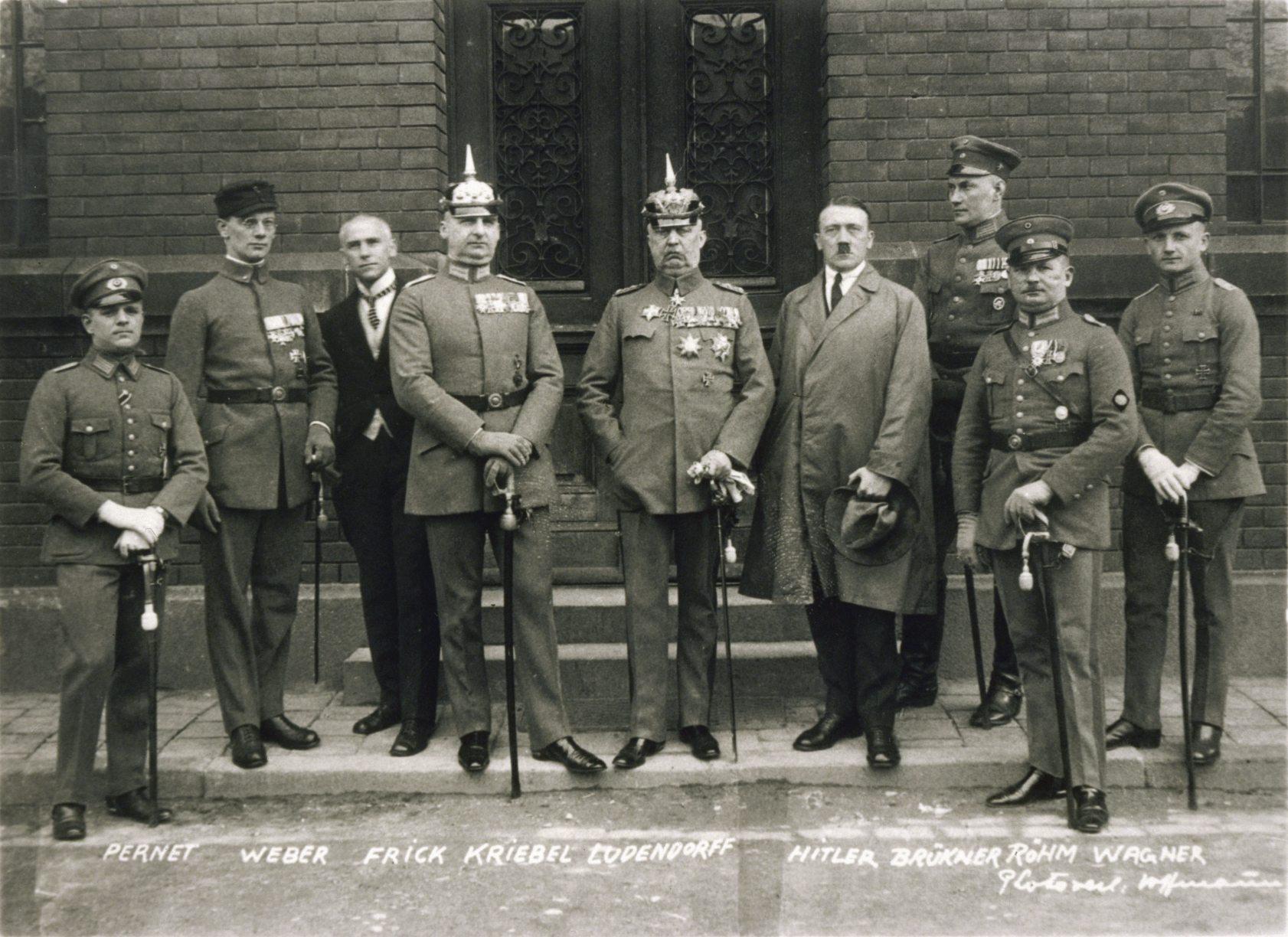 Defendants in the 1924 Beer Hall Putsch trial. From left to right: Pernet, Weber, Frick, Kriebel, Ludendorff, Hitler, Bruckner, Röhm, and Wagner.