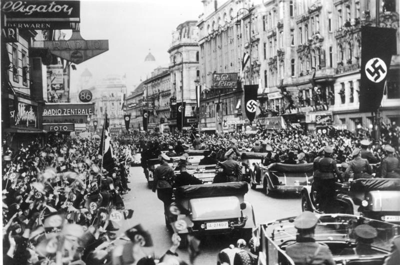 Cheering crowds welcome the Nazis in Vienna after the Anschluss, 1938.