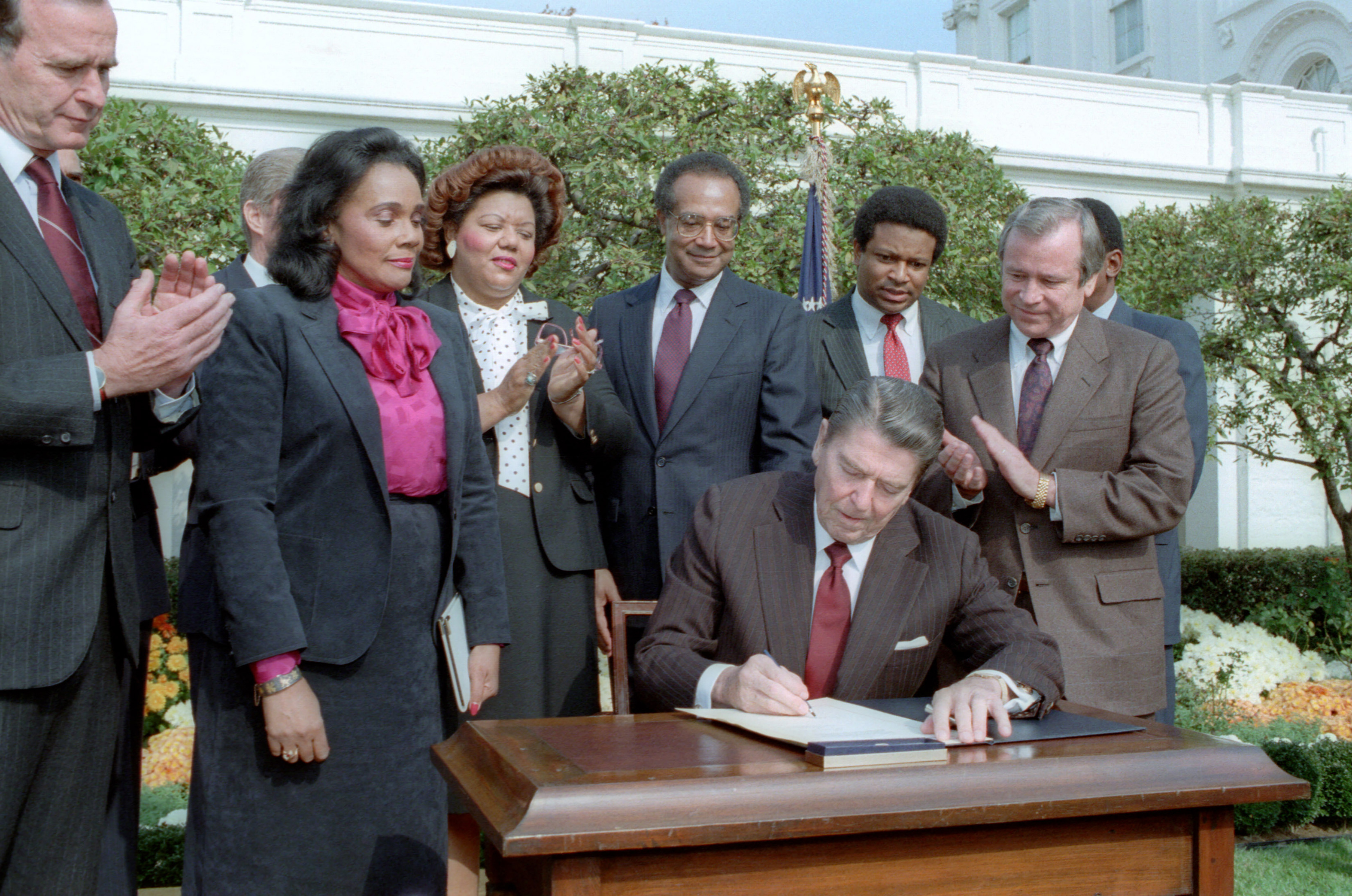 President Reagan at Signing Ceremony for Martin Luther King Holiday Legislation in the Rose Garden