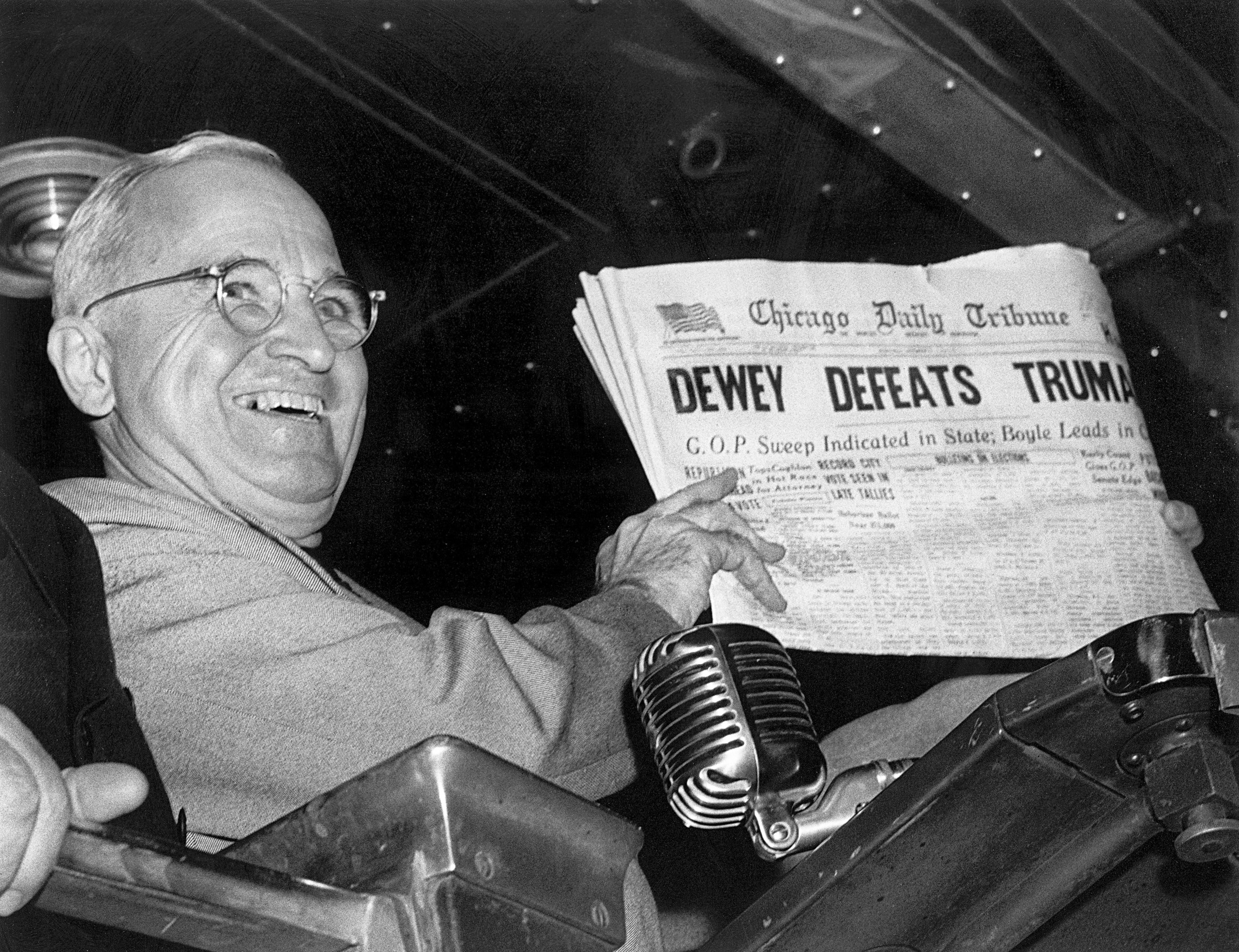 Harry S. Truman holding the Chicago Daily Tribune with the erroneous headline, "Dewey Defeats Truman" after winning the 1948 United States presidential election.