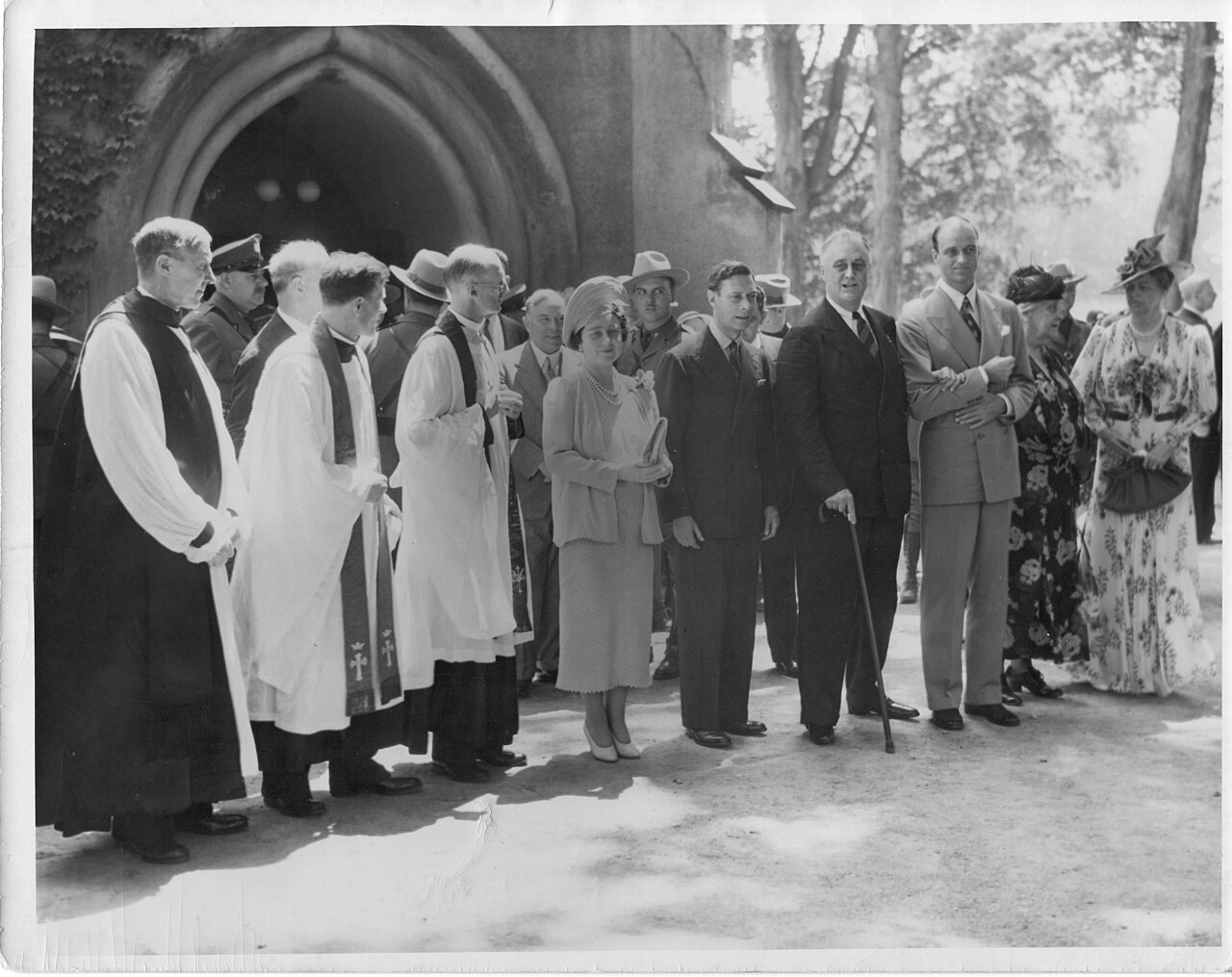 Franklin D. Roosevelt with King George V, Queen Elizabeth in front of the President's home church, St. James Episcopal Church in Hyde Park, New York, 1939.