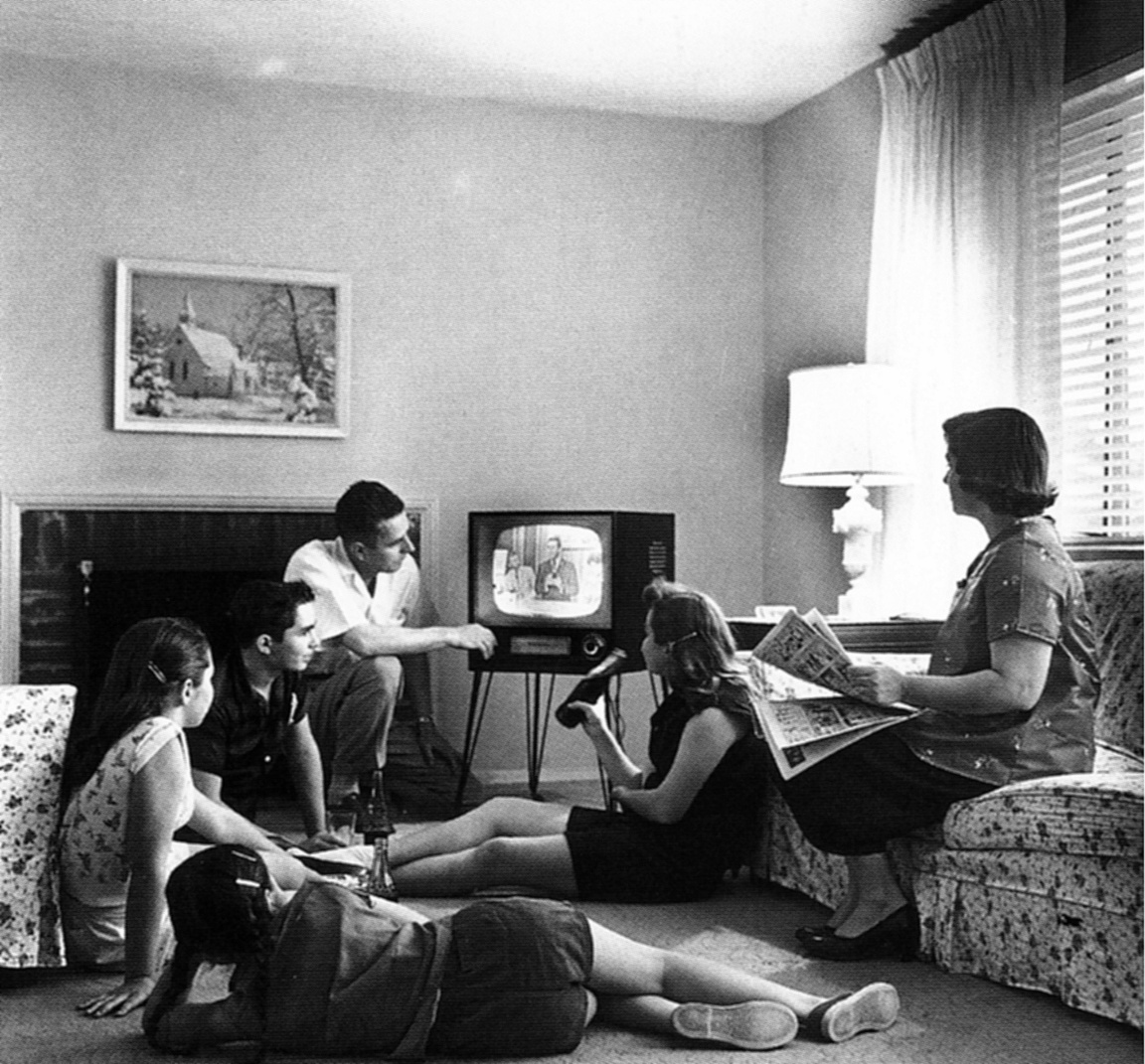 An American family watching television, 1958.