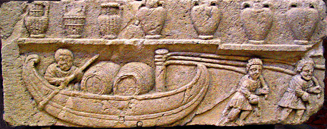 In this Gallo-Roman relief, a man transports wine barrels via river.