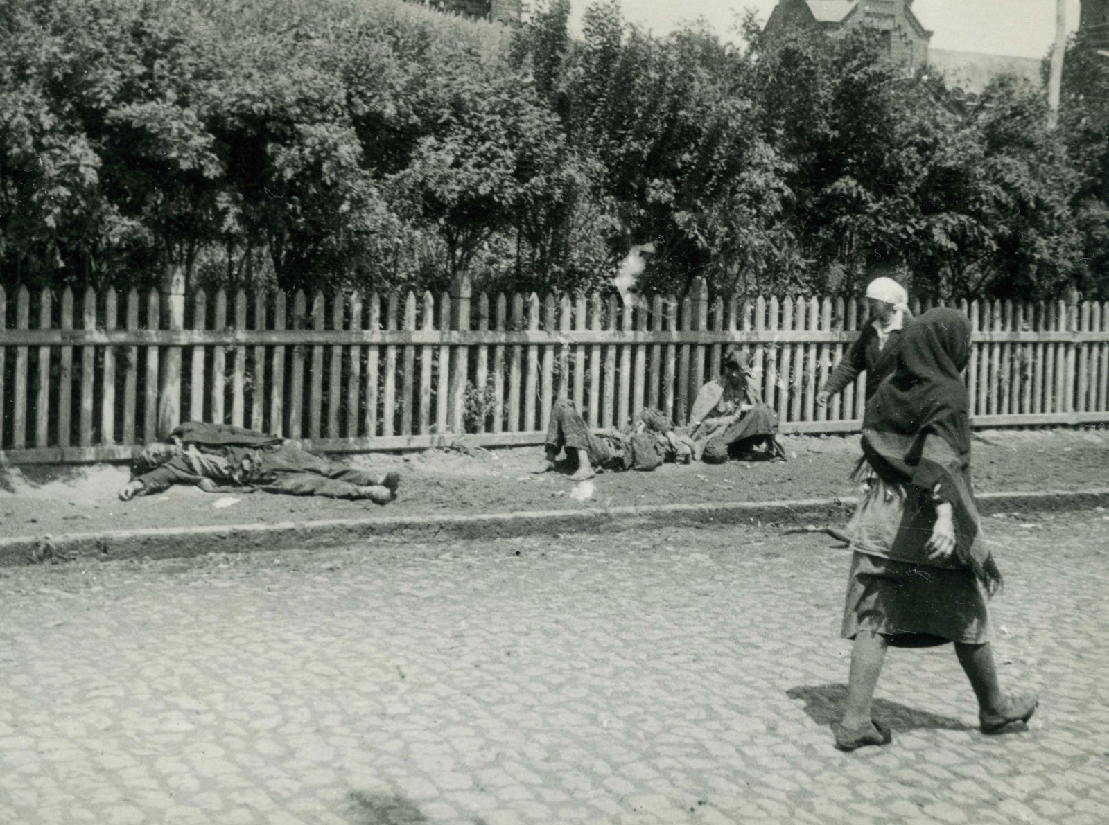 Starving peasants on a street in Kharkiv dduring the Holodomor, 1933.