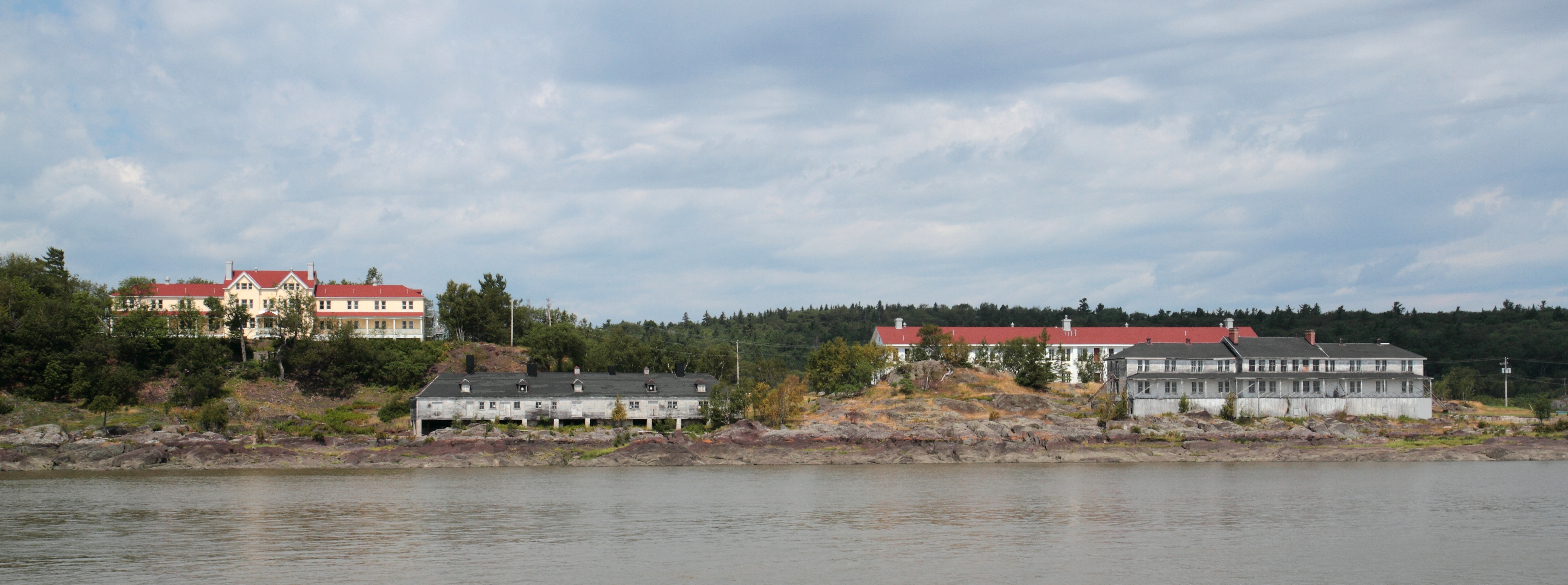 Quarantine stations on Grosse Île, Québec pictured in 2013 from the St. Lawrence Seaway