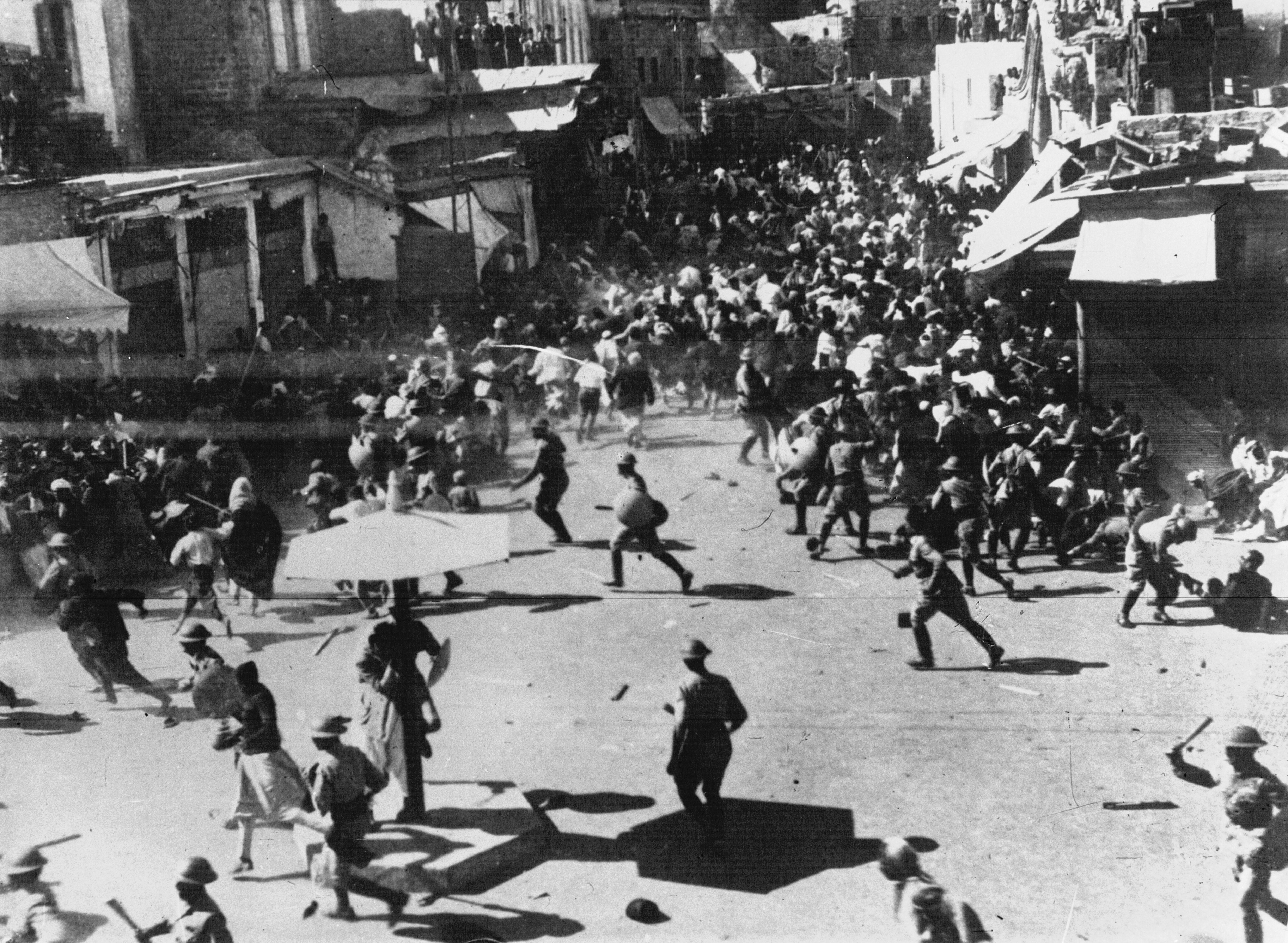 British policemen disperse an Arab mob during the Jaffa riots in April 1936