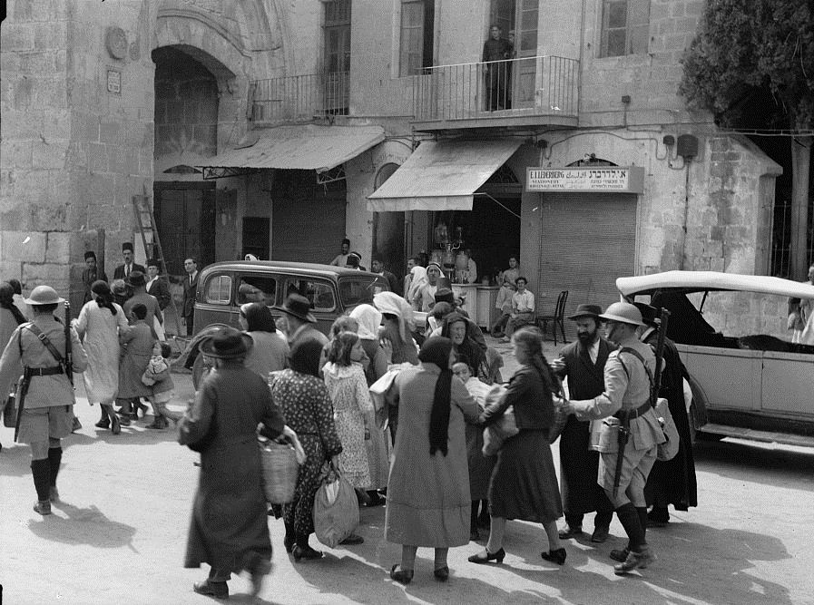 Jews evacuate the Old City of Jerusalem after Arab revolt in 1936.