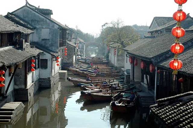 Jiangsu province is a watery coastal region, famed for its canals since ancient times. This photograph shows the historic town of Zhouzhuang