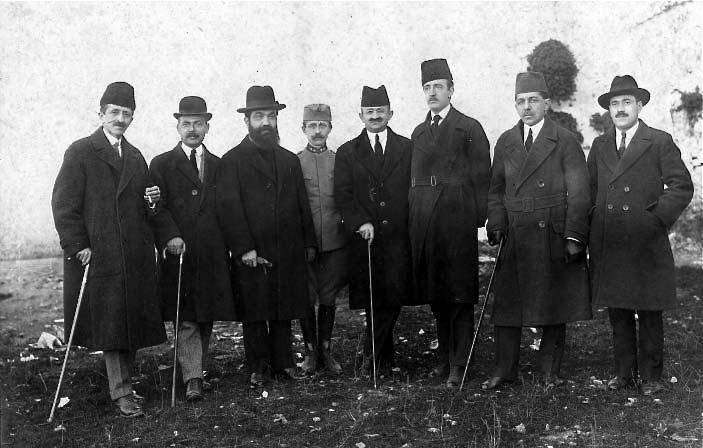 The Albanian Government headed by Xhafer Ypi formed on 24 December 1921. From the left: Mehmed Konica, Spiro Koleka, Fan Noli, Ismail Haki Tatzati, Xhafer Ypi, Ahmet Zogu, Hysen Vrioni, Kolë Thaçi.