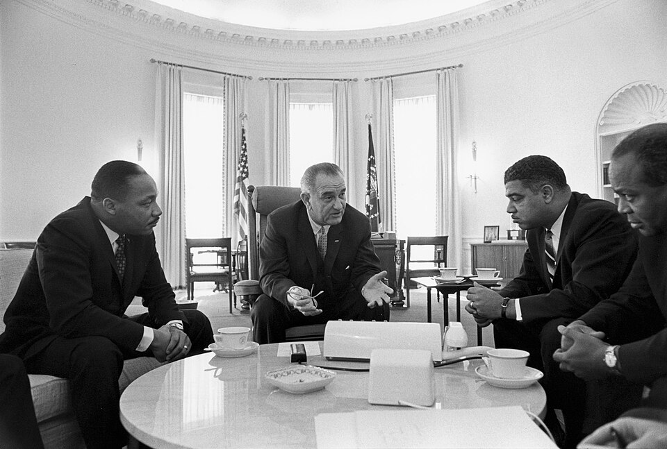 President Lyndon B. Johnson meets with Civil Rights leaders Martin Luther King, Jr., Whitney Young, James Farmer, 1964.