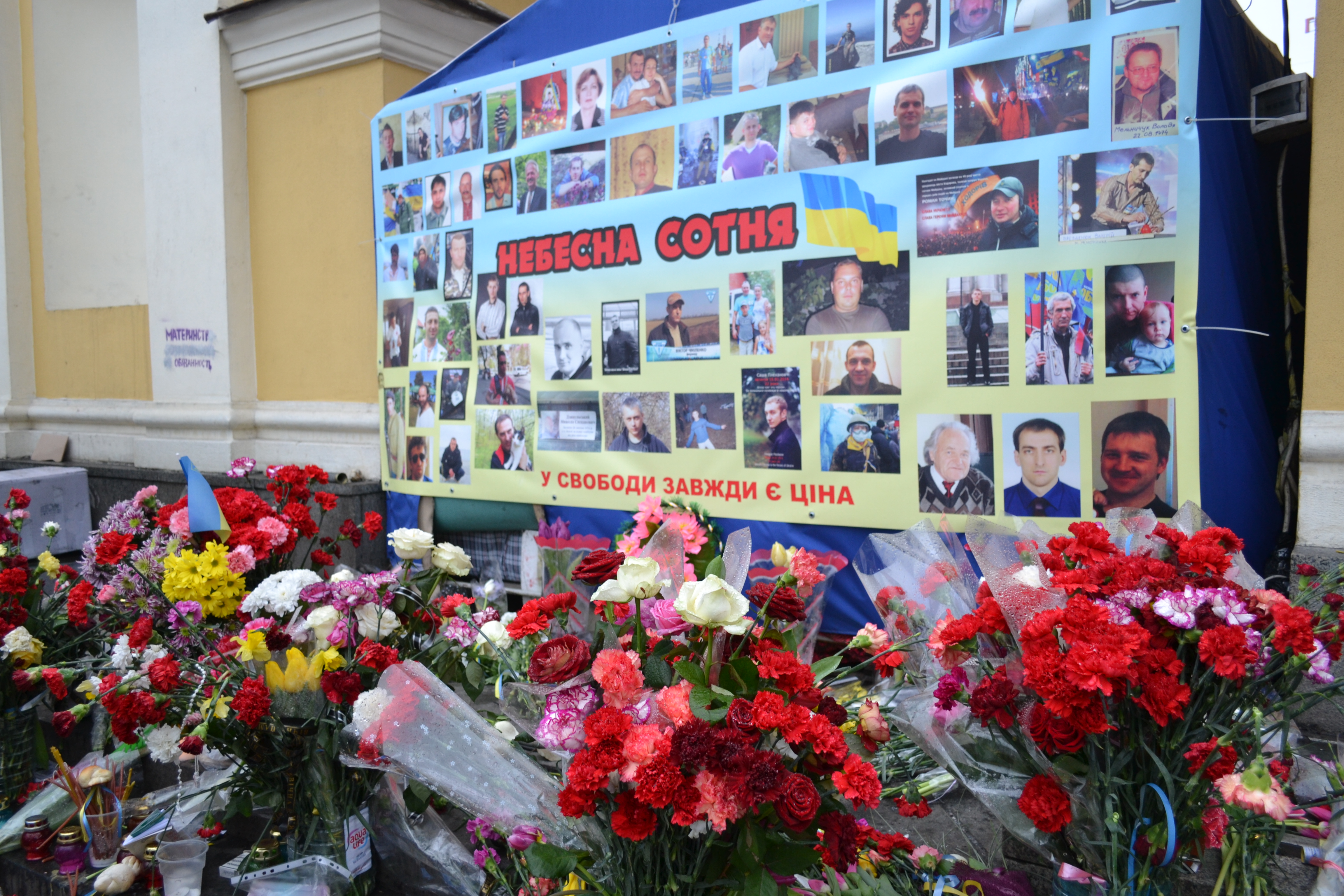 A memorial to the Heaven’s Hundred in Kyiv. Serhii Kemsky’s photo is in black and white under the words Nebesna sotnia.