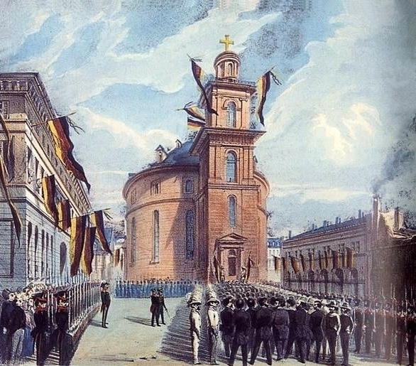 The exterior of St. Paul’s Church in Frankfurt, with the procession of the pre-Parliament in March 1848. 