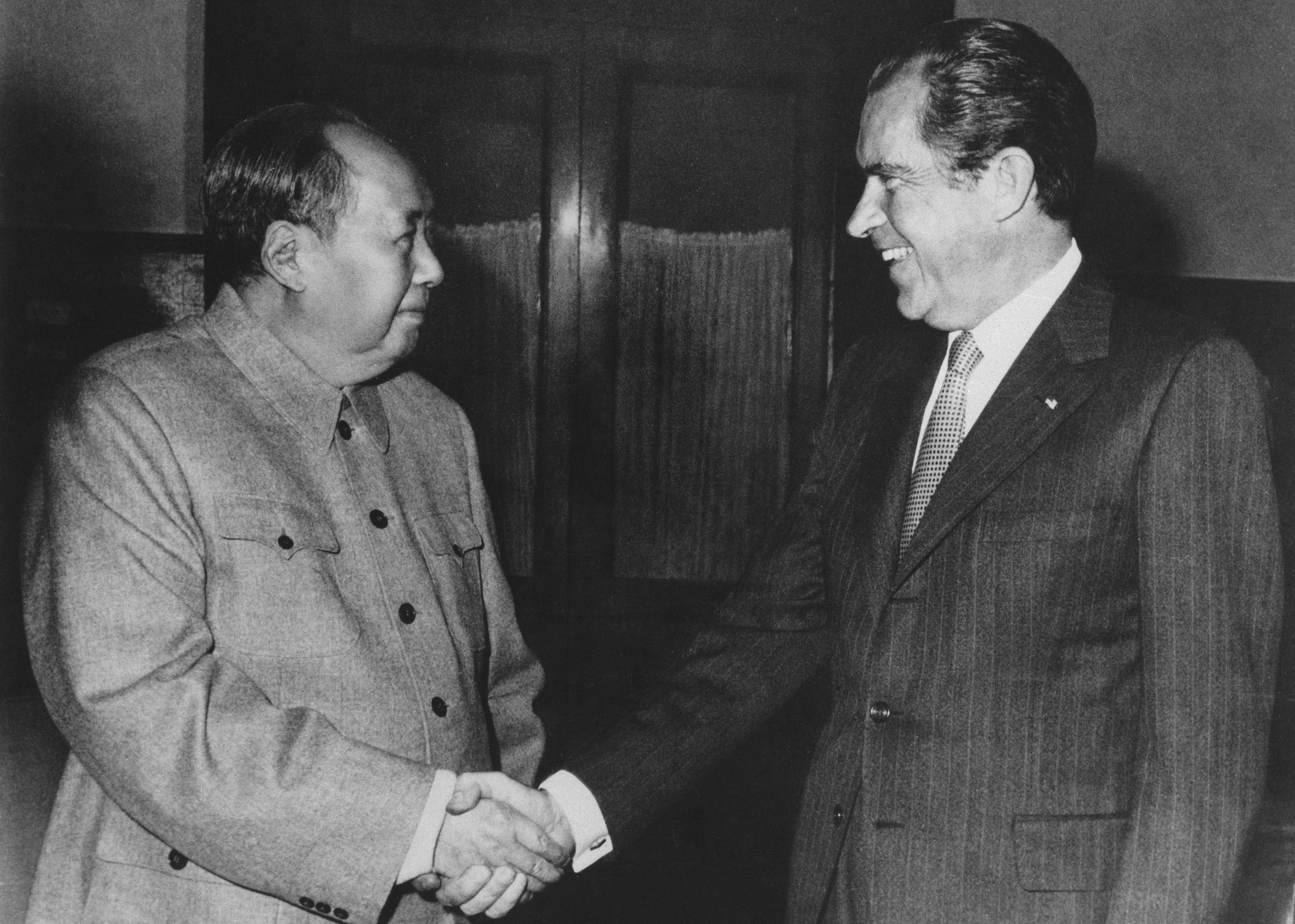 President Richard Nixon Shaking Hands with Chairman Mao Zedong.