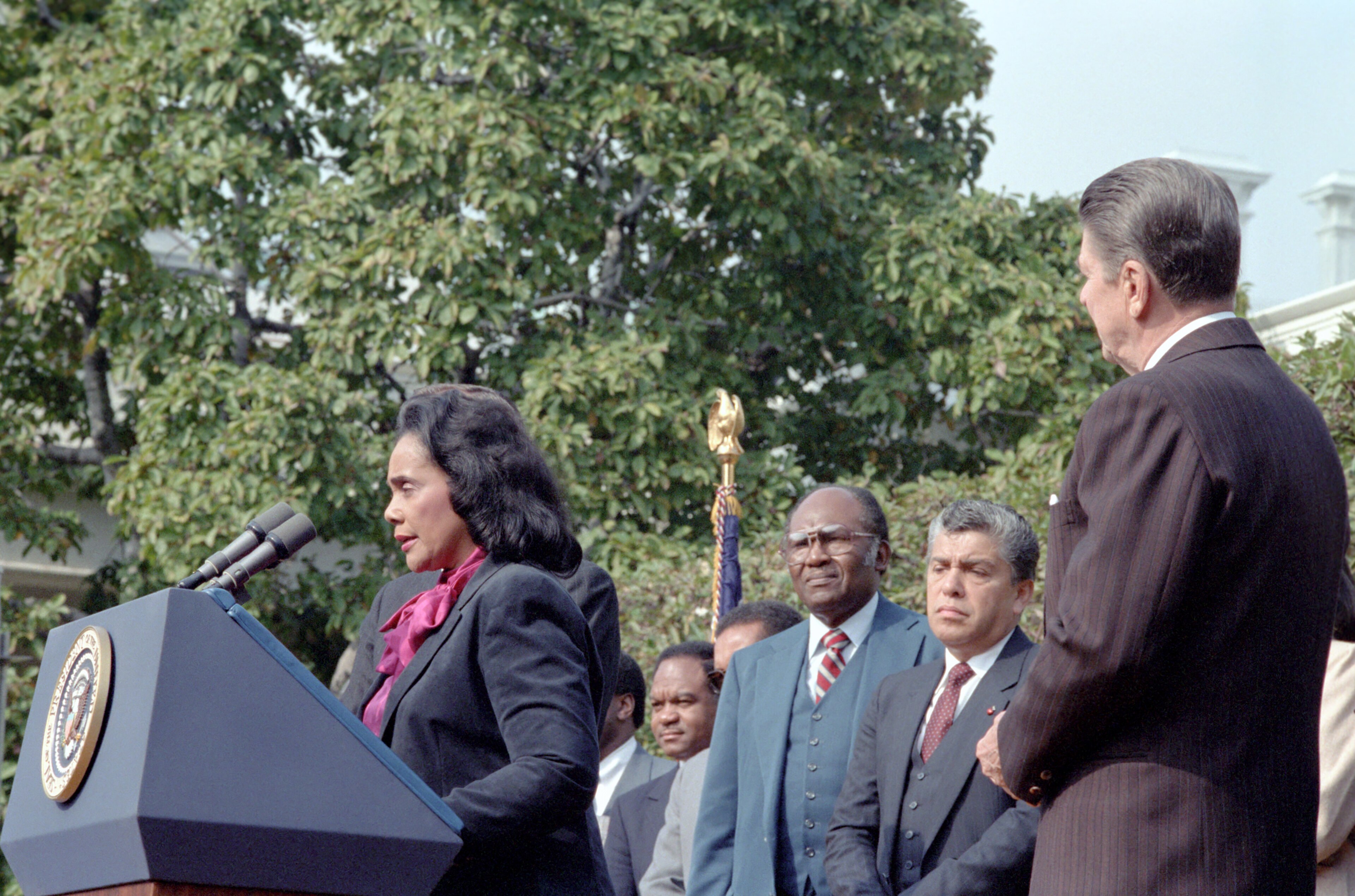President Ronald Reagan Listening to Coretta Scott King During The Signing Ceremony for H.R. 3706, Making The Birthday of Martin Luther King Jr. a National Holiday in The Rose Garden, 11/2/1983