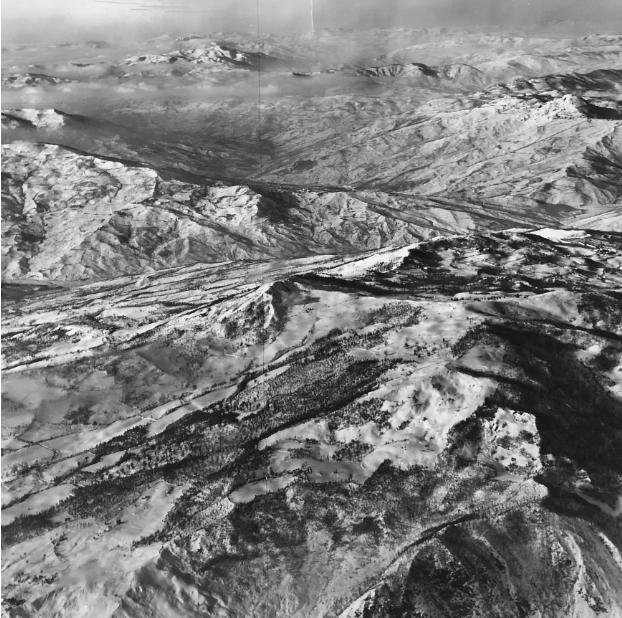 An aerial view of rugged terrain surrounding Mount Belvedere, a prominent Apennine peak overlooking the 10th Mountain Division’s sector upon their arrival in Italy in early 1945. Photograph, Harris Dusenberry Collection, TMD57, OV Box 1, 10th Mountain Division Resource Center, Denver Public Library (DPL). Image courtesy of the DPL.