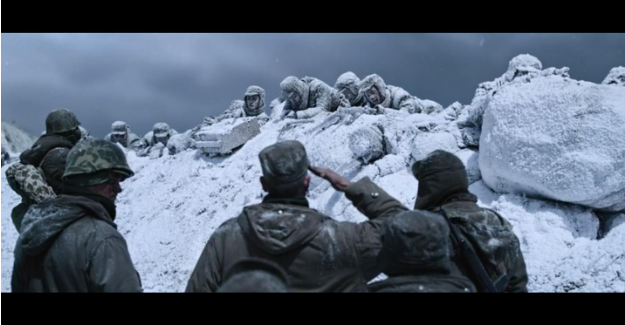 Maj. General Oliver Smith saluting frozen Chinese soldiers after the battle in The Battle of Lake Changjin. Screenshot from the streaming version of the film on Amazon Prime.