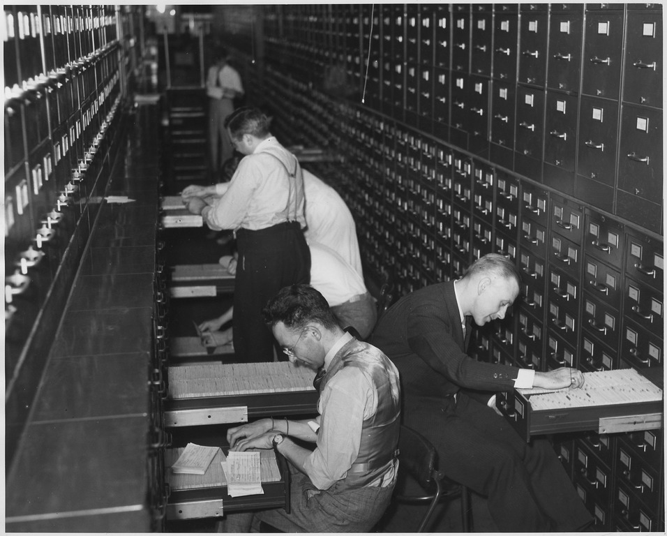 Employees of the Social Security Administration filing workers' applications.