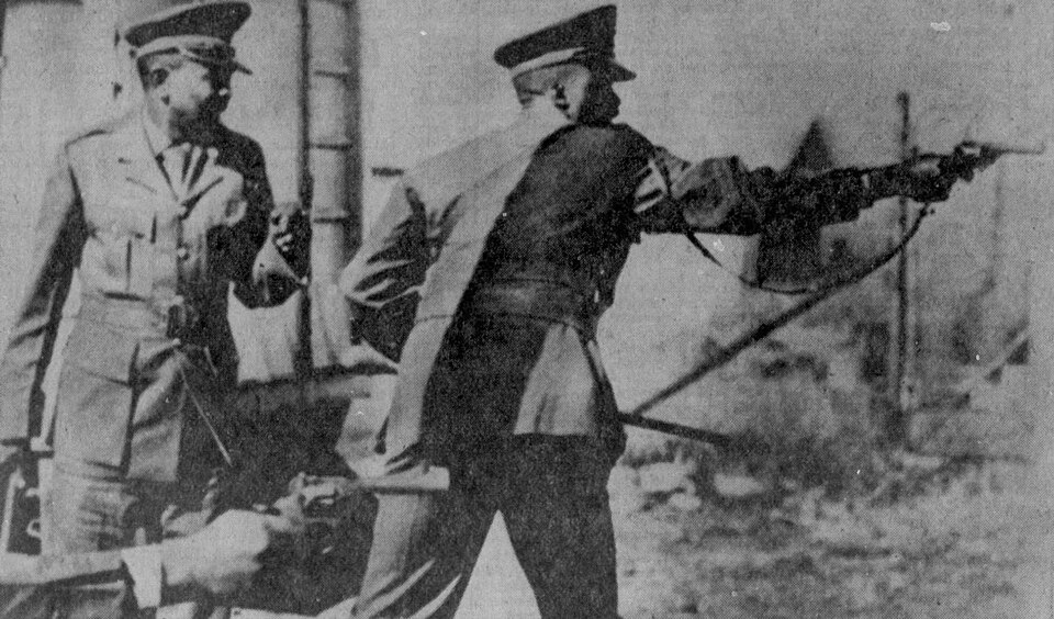 South African police aim at Black protestors in the Soweto uprising