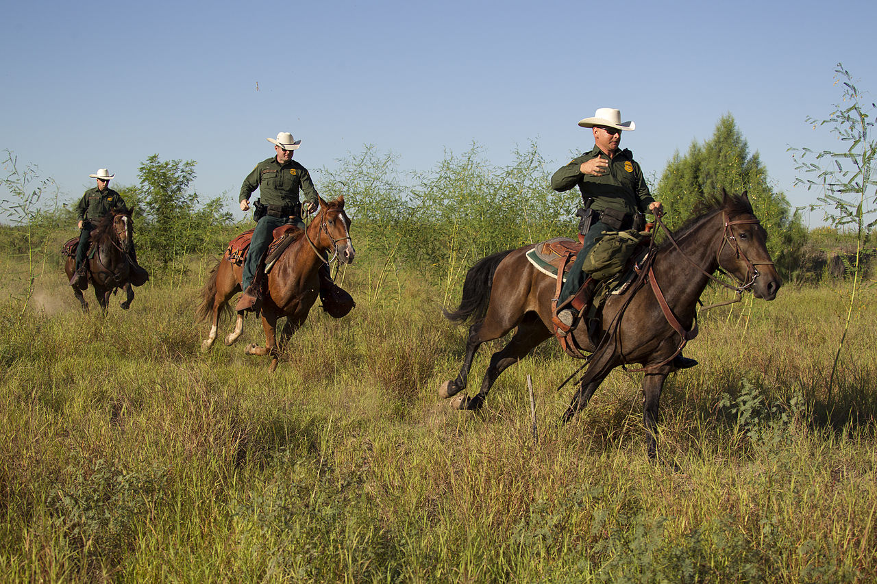 CBP, Border Patrol agents on patrol on horseback in South Texas, 2013.