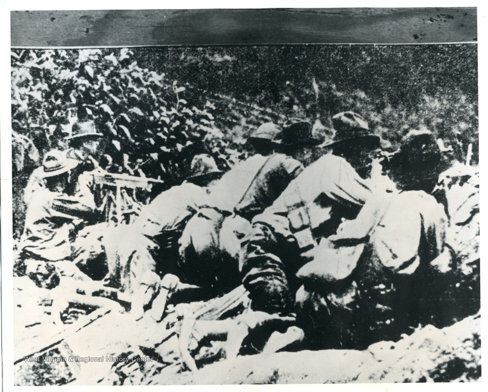 State police and mine guards in trenches on Blair Mountain.