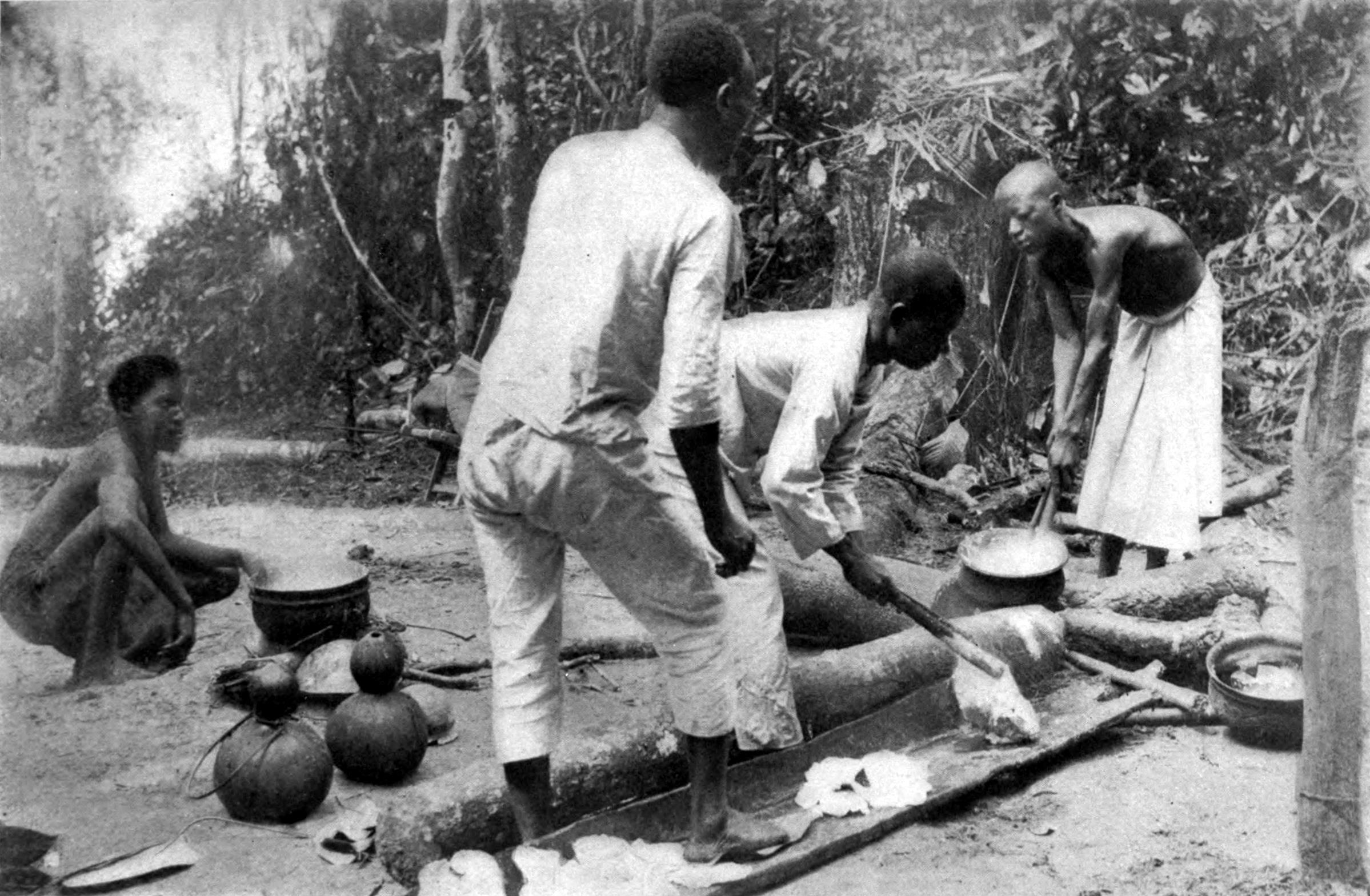 Congolese people melting latex in the Forest of Lusambo, 1890s.