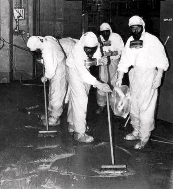 A clean-up crew working to remove radioactive contamination at Three Mile Island, 1979.