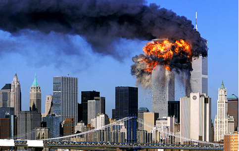 The top of the south tower of the World Trade Center explodes after being struck by United Airlines flight 175.