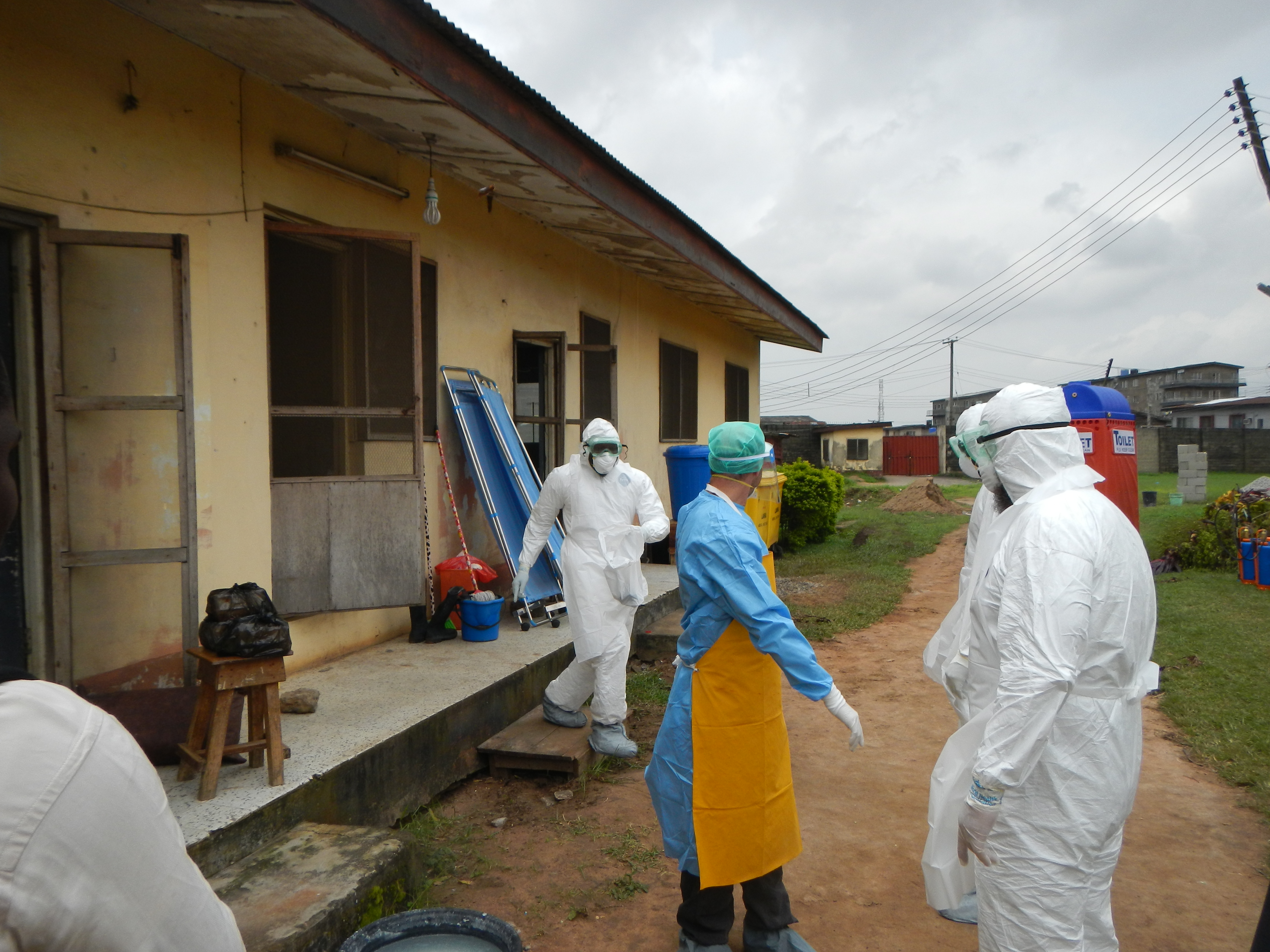 World Health Organization workers gearing up to go into old Ebola isolation ward in Lagos, Nigeria.
