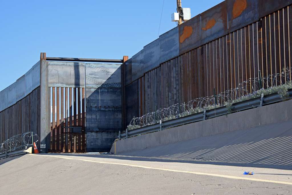 A gate at the El Paso 4-mile border barrier as seen from the U.S. edge of the Rio Grande River, 2019.