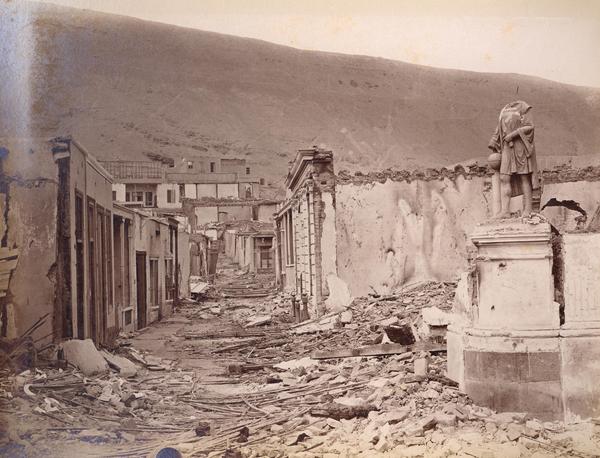 Photograph of the ruins of Chorrillos, showing a decapitated Christopher Columbus monument after the Battle of Chorrillos, 1881.