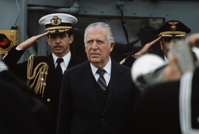 President Fernando Belaunde Terry reviews an honor aboard the destroyer USS Thorn, 1984.