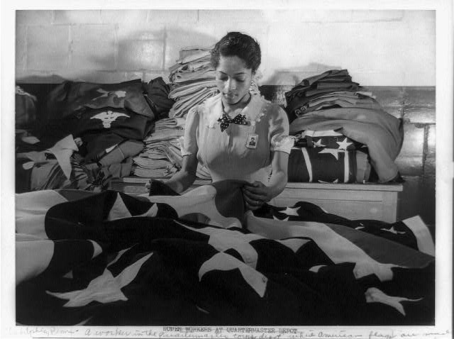 Making flags for military use in the quartermaster corps depot in Philadelphia, Pennsylvania, 1942.