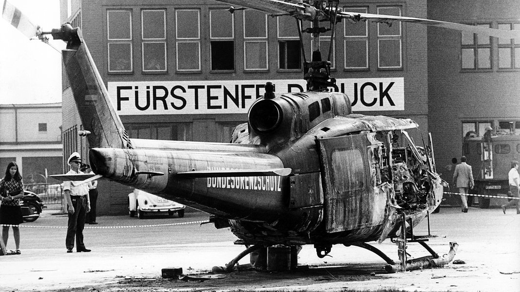 Wreckage of a helicopter on the runway in Munich.