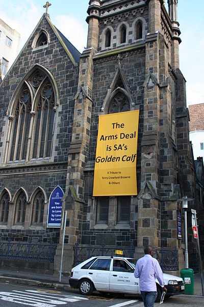 A banner on a Cape Town church criticizing an arms deal in 1999