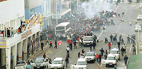 Security guards in South Africa clashing with police during a 96-day strike of private security personnel in 2006