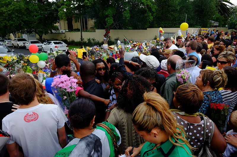 The public standing vigil outside Nelson Mandela’s house in Johannesburg after his death in 2013