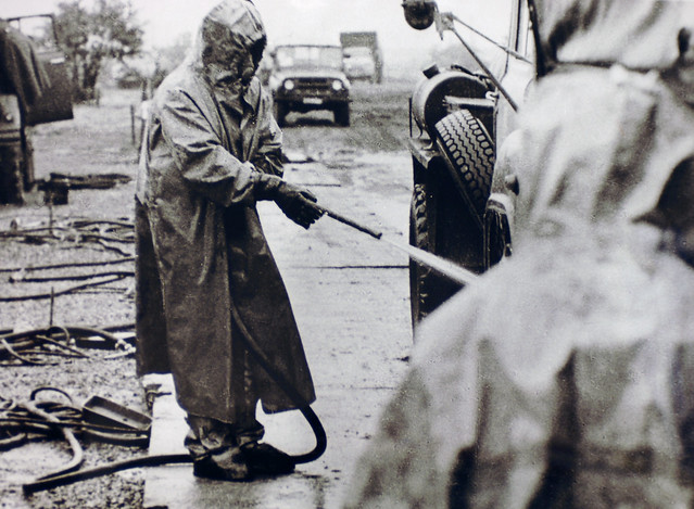 A military reservist, called to service in the wake of the disaster, involved in the decontamination process.