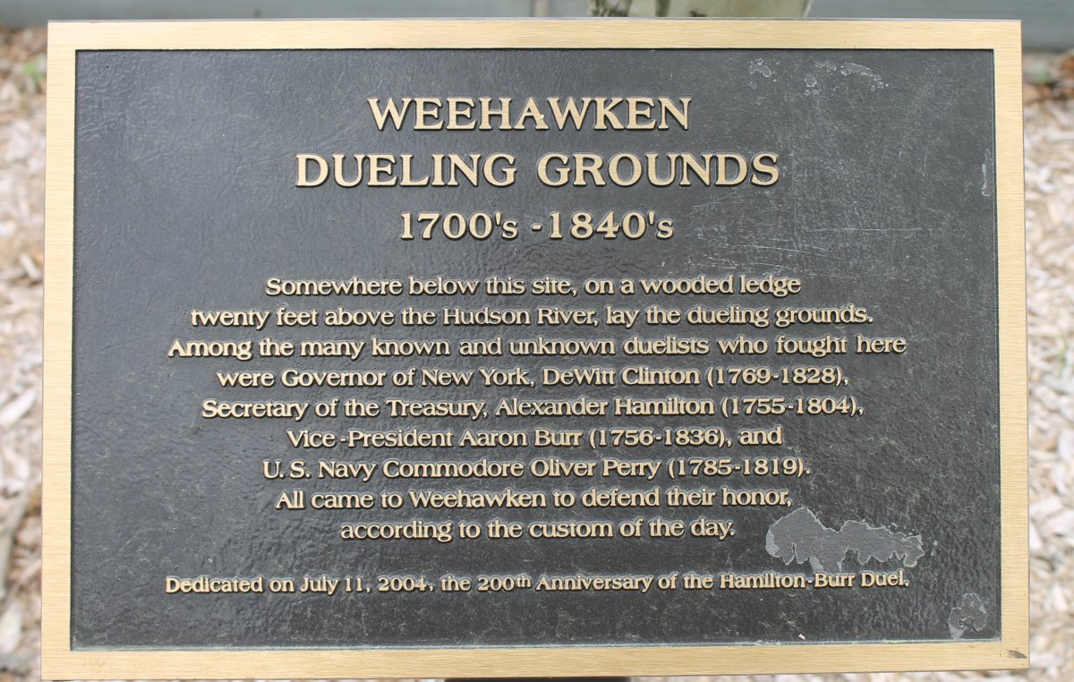 A plaque designating the Weehawken, NJ dueling grounds where the Hamilton-Burr duel took place.