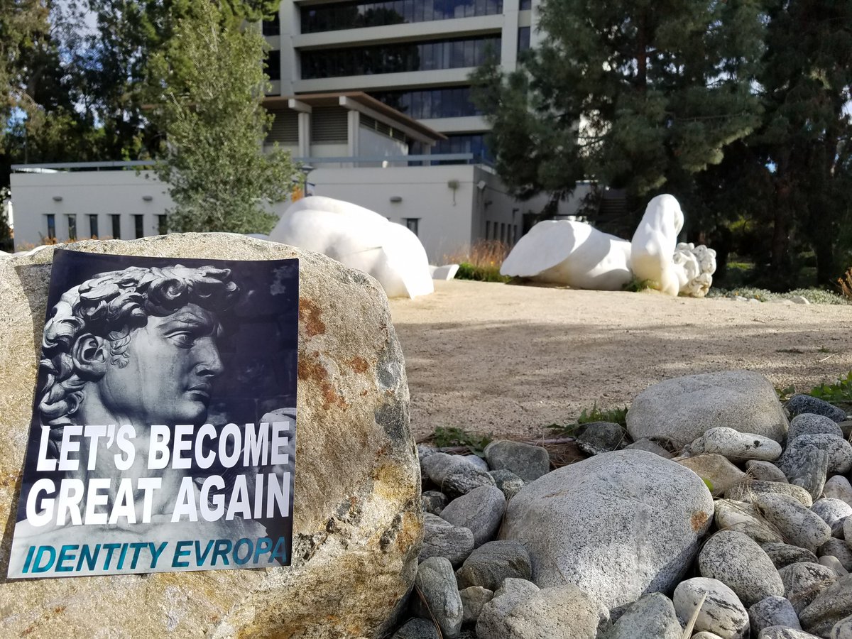 A 2018 Identity Evropa propaganda poster featuring Michelangelo’s statue of David in front of a fallen replica of the statue.